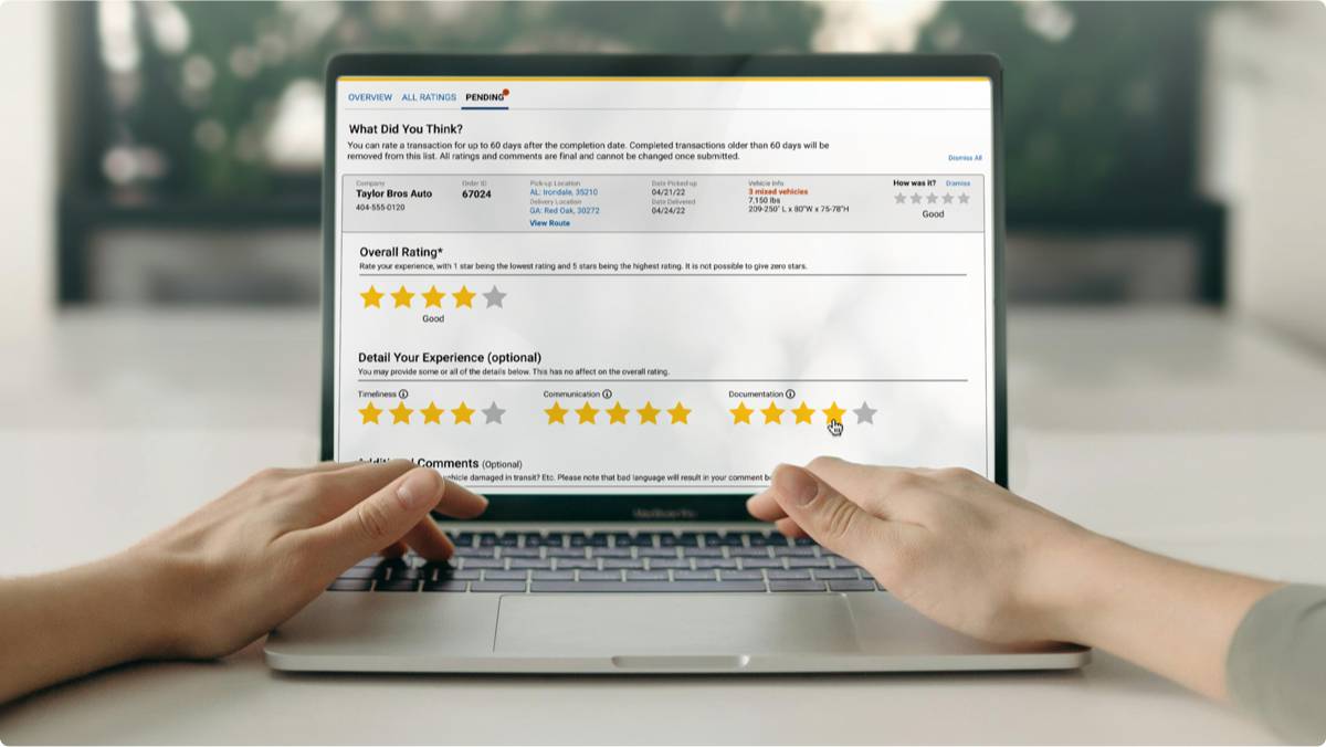 Person rating & reviewing on a laptop